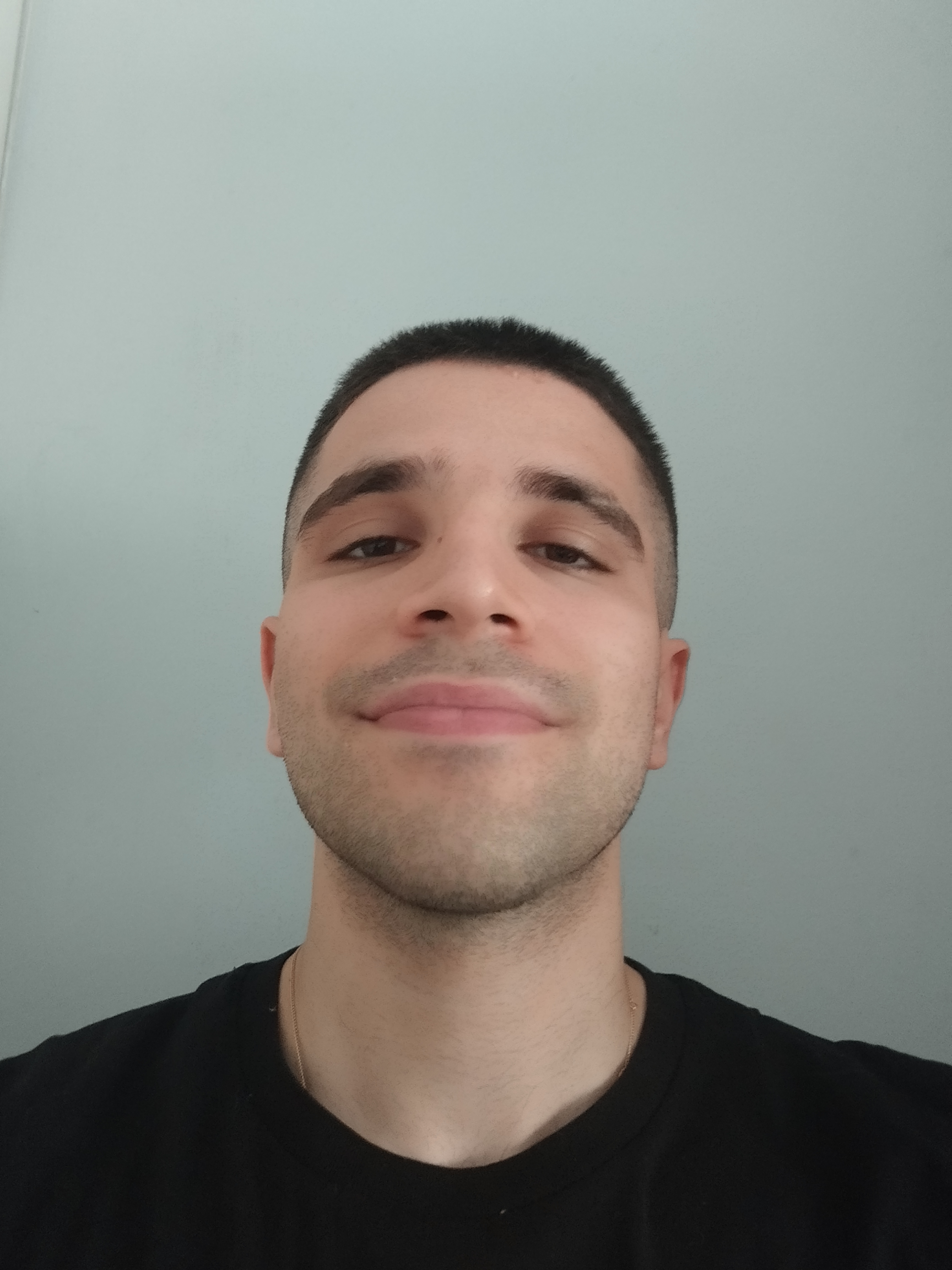 A headshot of David Cerdeiro.
